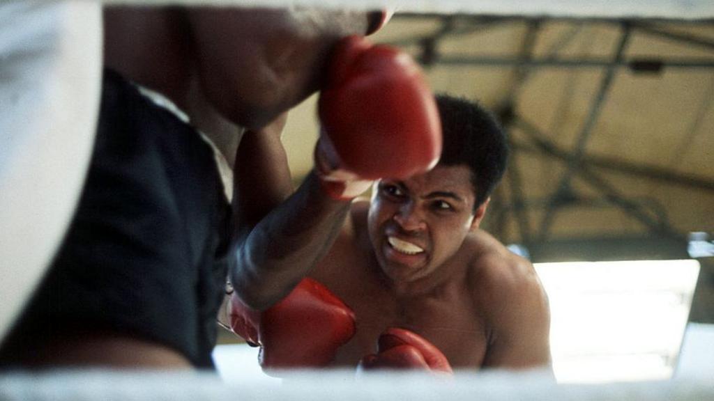 Muhammad Ali throws a punch at Al 'Blue' Lewis at Croke Park