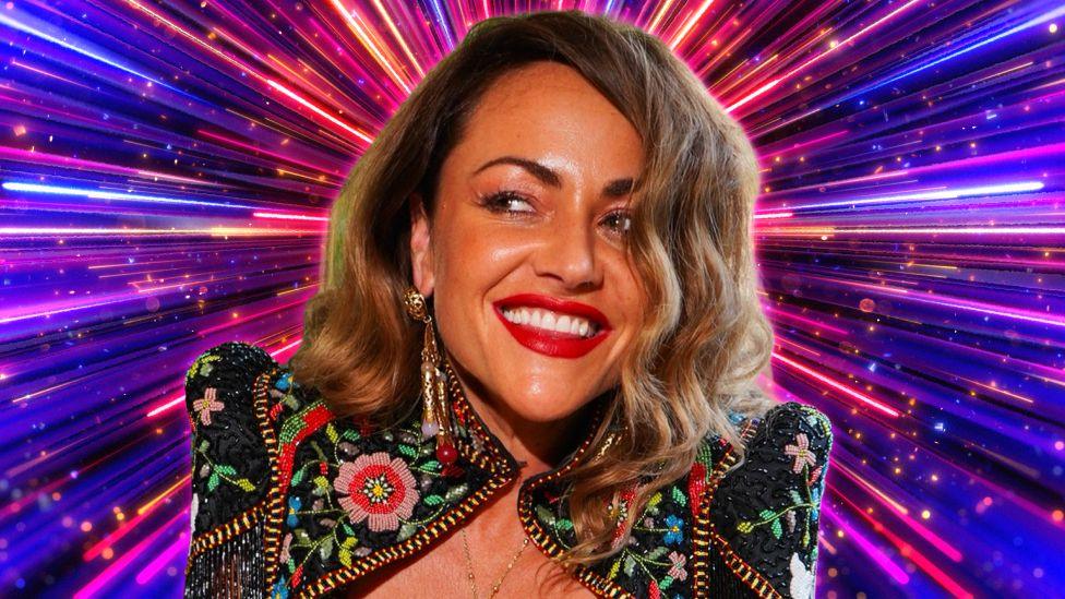 Jaime Winstone pictured in front of a sparkly background