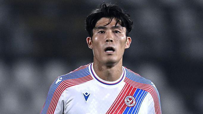 Takehiro Tomiyasu playing for Crystal Palace during a pre-season friendly against AlUla in 2026