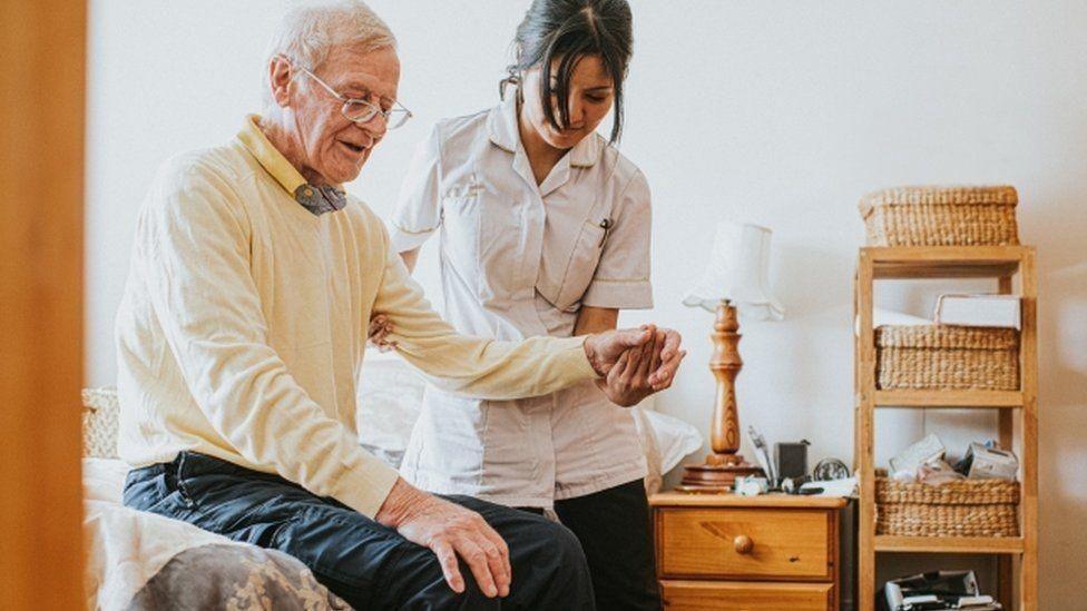 Welsh national social care service will not arrive before next Senedd election, says minister Welsh national social care service will not arrive before next Senedd election, says minister