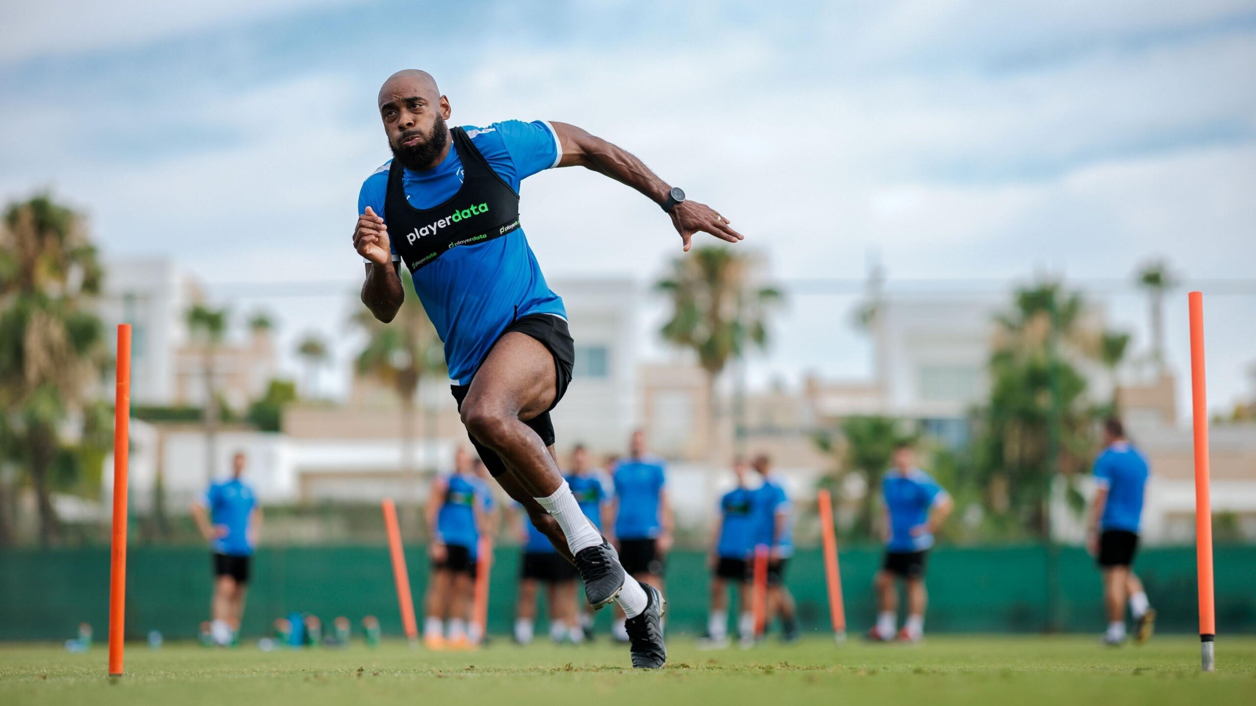 Premier League referee Sam Allison running at a training session