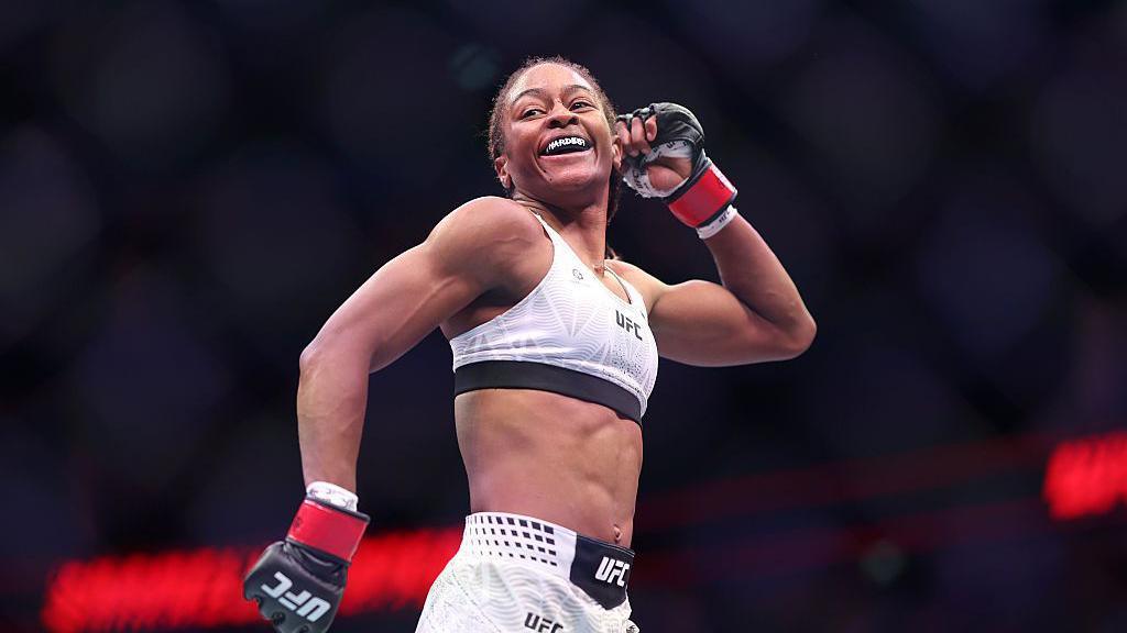 Shanelle Dyer celebrates beating Ravena Oliveira at UFC London in March