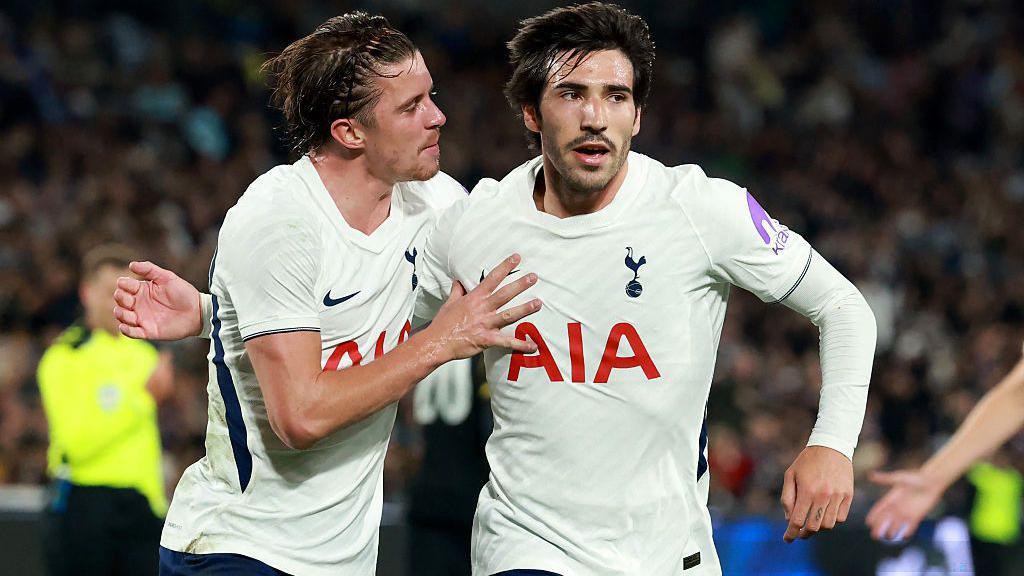 Sandro Tonali is joined in celebration by Conor Gallagher after scoring for Tottenham against Chelsea in Sydney