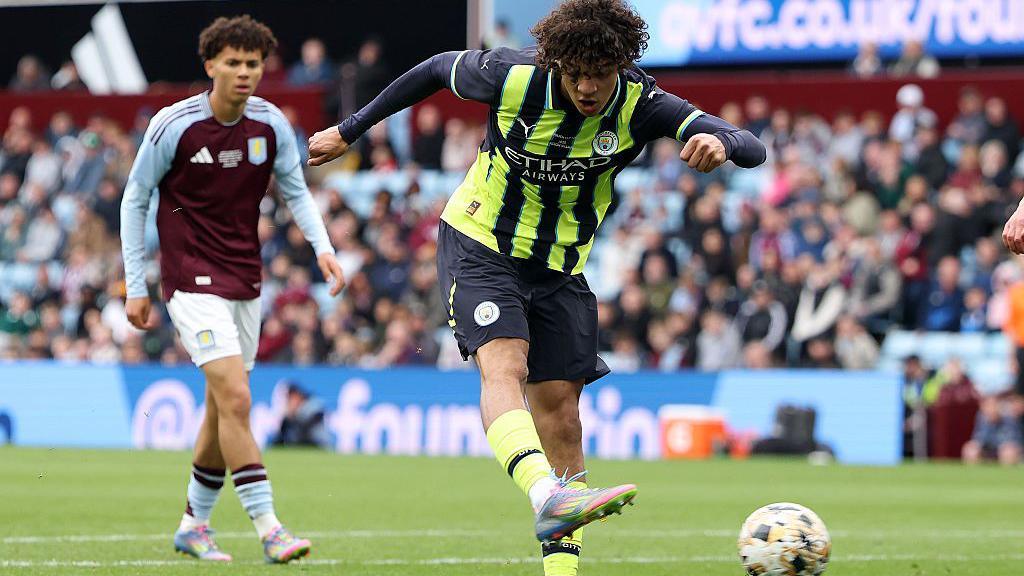 Luca Fletcher playing for Manchester City