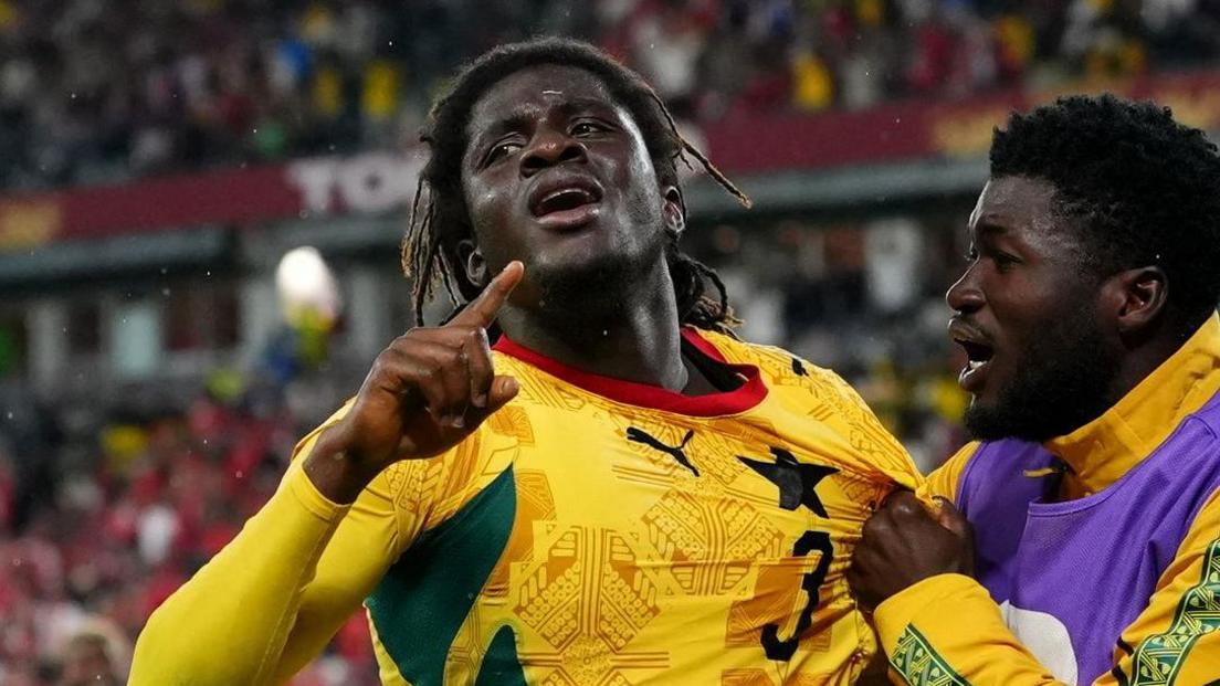 Caleb Yirenkyi (left) celebrates his 95th-minute winner for Ghana against Panama at the World Cup with Christopher Baah (right)