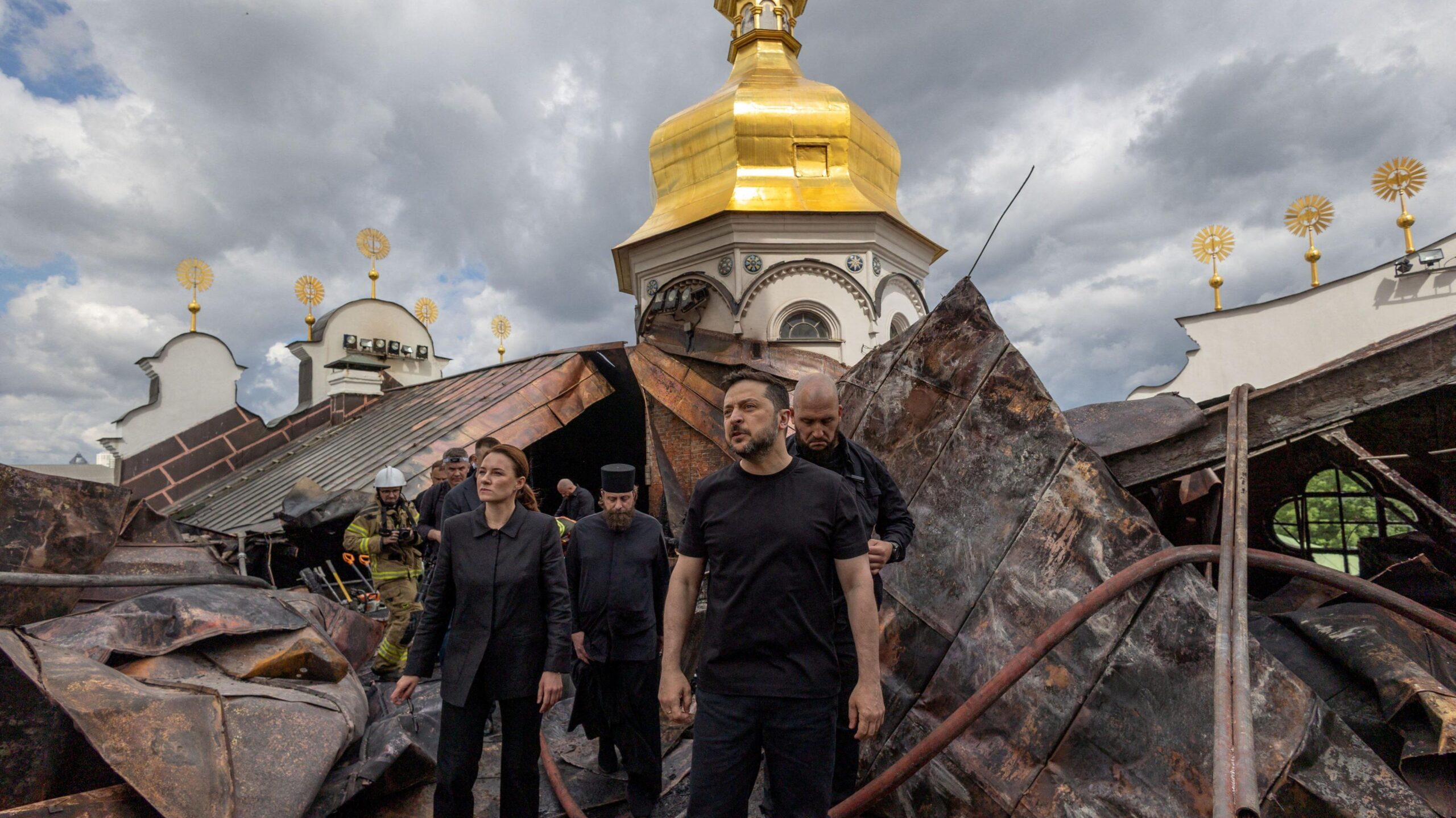 Ukraine's President Volodymyr Zelenskiy and Ukrainian Prime Minister Yulia Svyrydenko visit the Dormition Cathedral of the Kyiv Pechersk Lavra, which was hit during Russian missile and drone strikes, amid Russia's attack on Ukraine, in Kyiv, Ukraine June 15, 2026.
