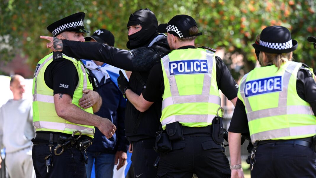 Man, 29, arrested in police raid over racist traffic-cone attack Man, 29, arrested in police raid over racist traffic-cone attack