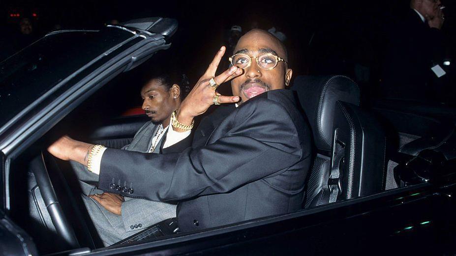 Tupac and Snoop Dogg appear outside the American Music Awards in Los Angeles