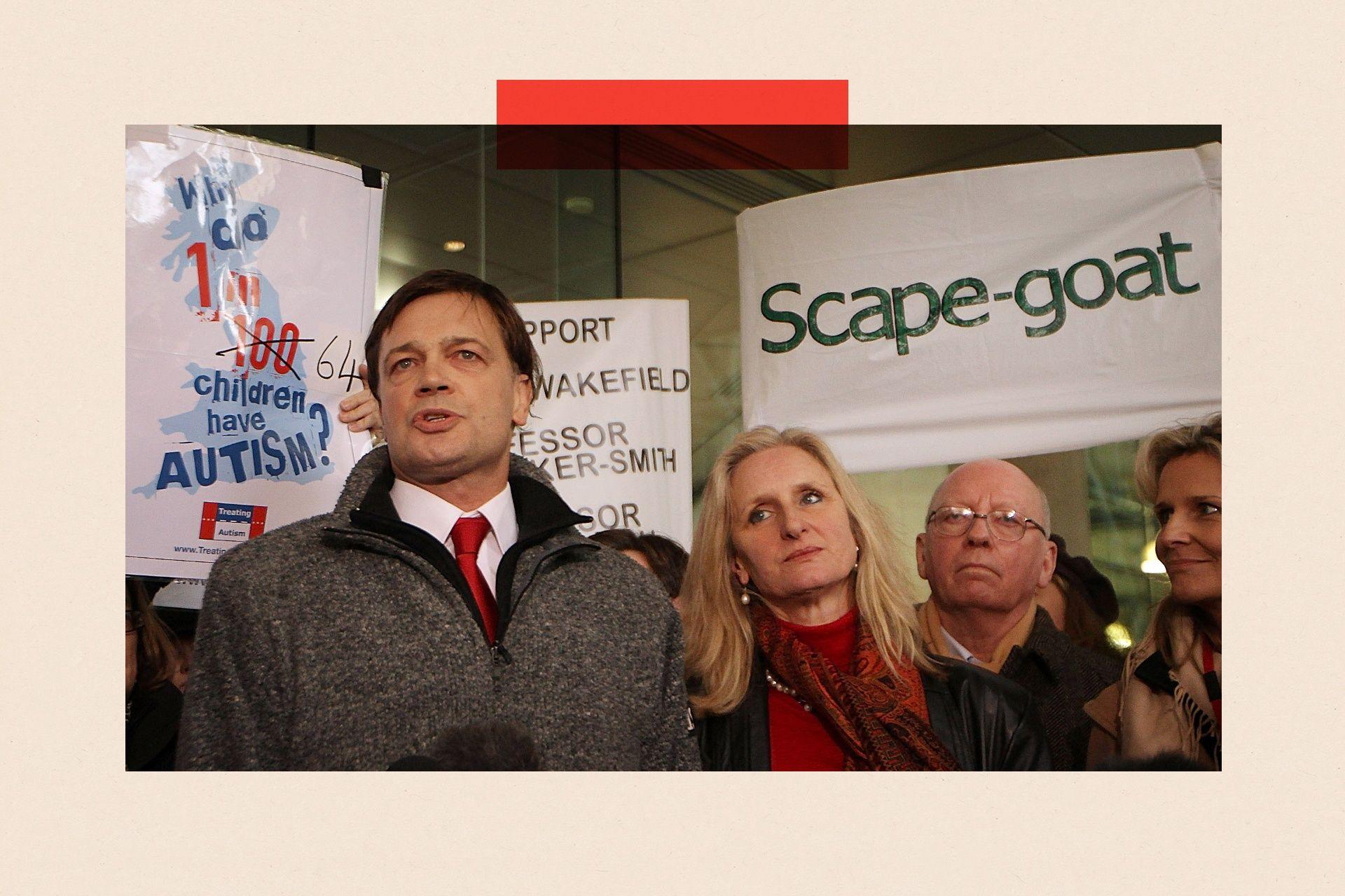Andrew Wakefield, in a grey jumper, addresses a crowd