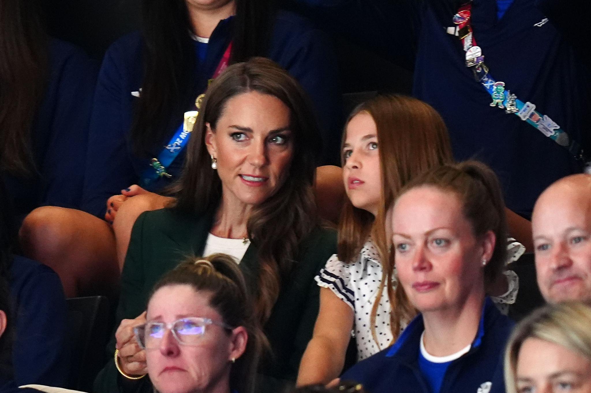 The Princess of Wales, known as the Duchess of Rothesay when in Scotland, with Princess Charlotte during the netball semi-final match