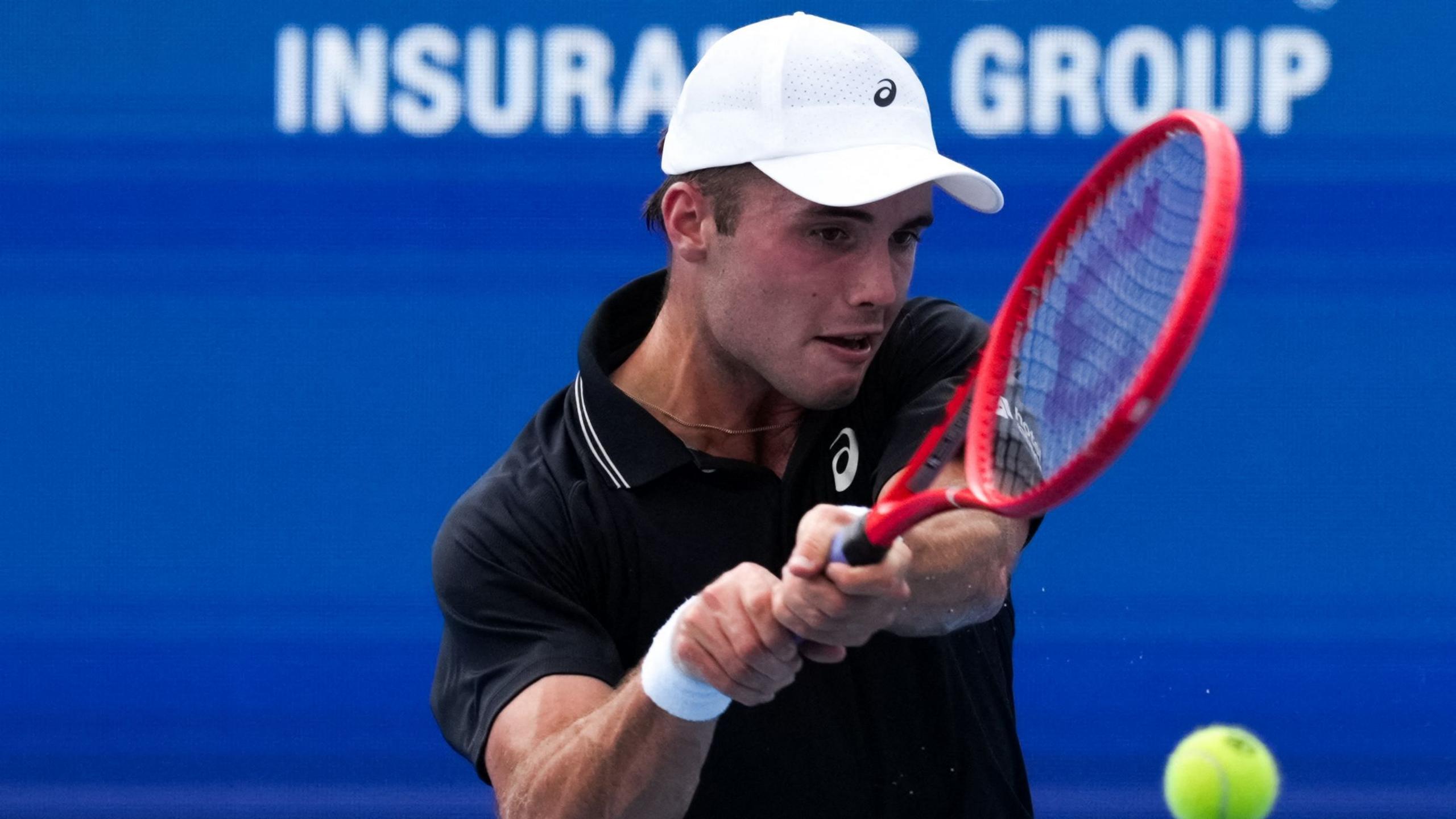 Arthur Fery hitting the ball during his quarter-final victory at the Winston-Salem Open