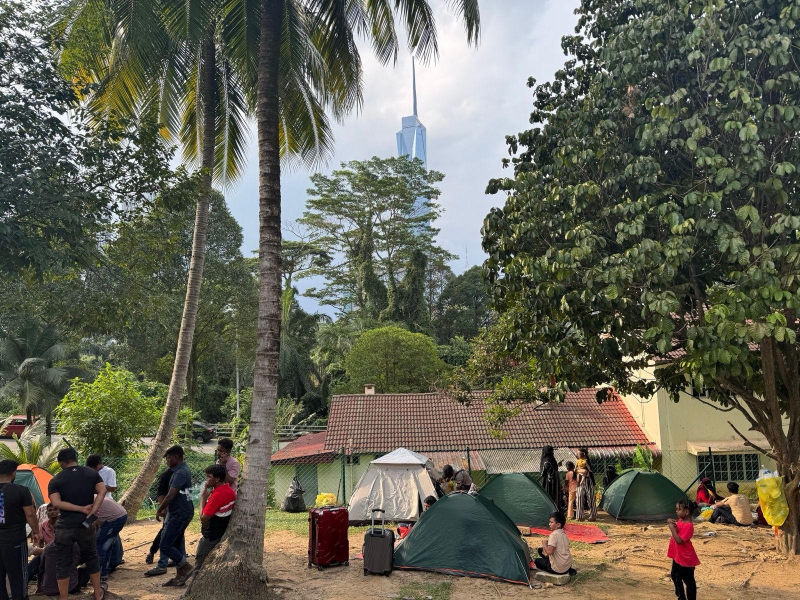 Rohingya refugees set up tents outside the UN's refugee agency in Kuala Lumpur
