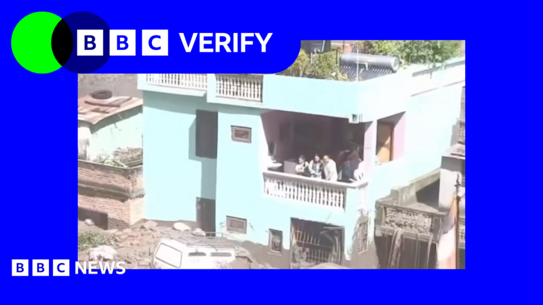 Videos show people survive floodwaters on balcony in Nepal Videos show people survive floodwaters on balcony in Nepal