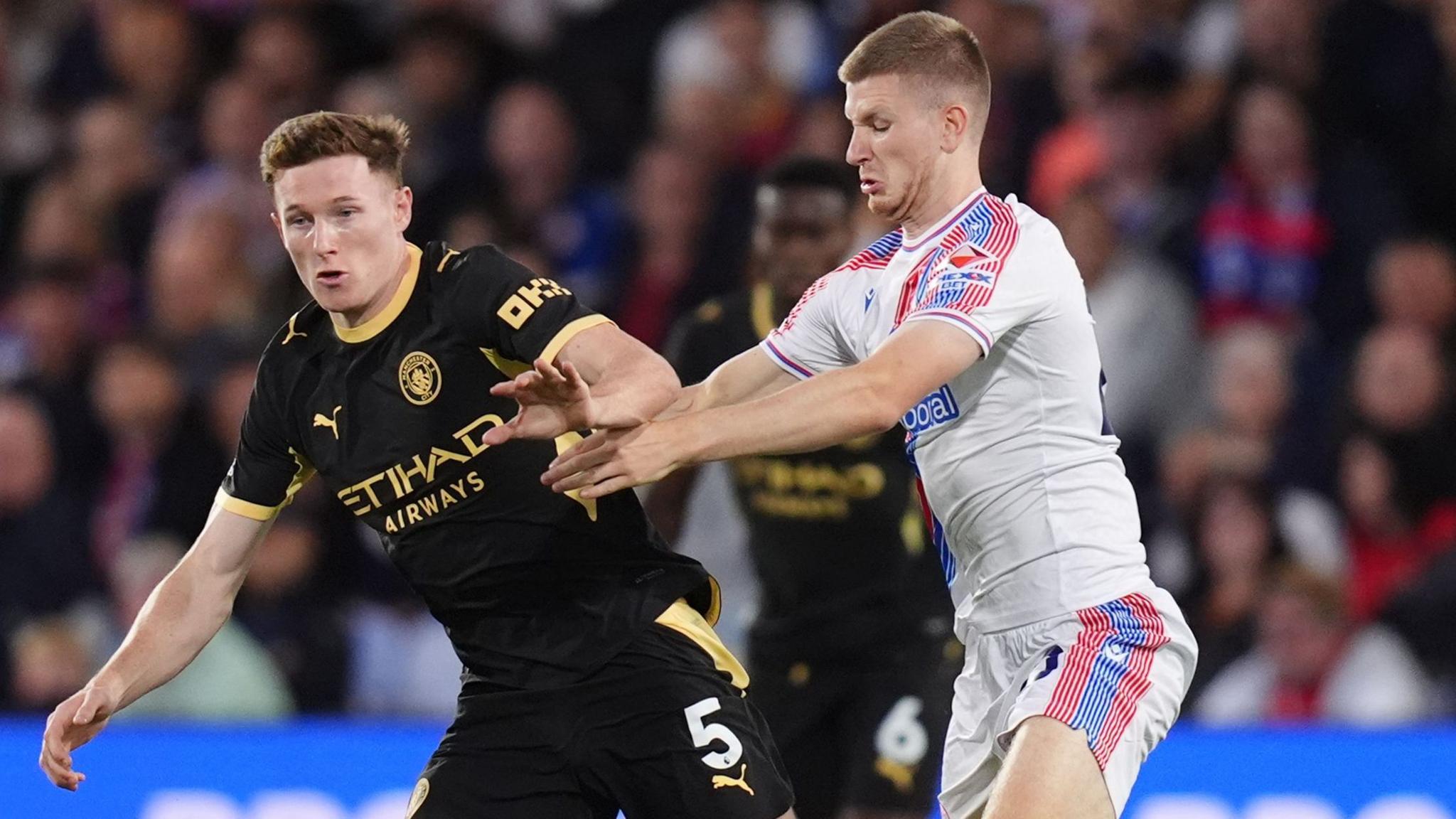 England midfielders Elliot Anderson and Andy Wharton contest possession in the Premier League game between Manchester City and Crystal Palace at Selhurst Park.