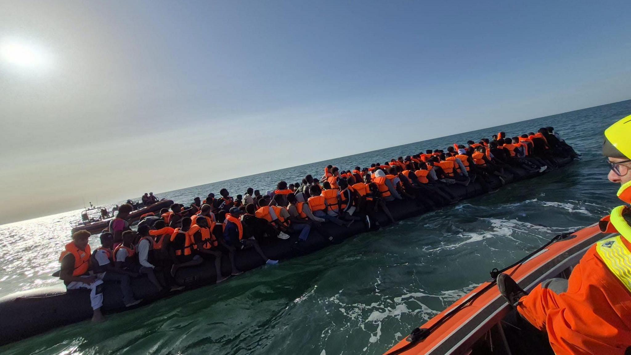 'Super Boat' 'Mega Dinghy' with a group of migrants on board a boat departing France