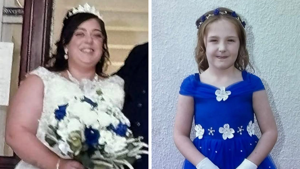 A composite image of Natalie McDonald and Valentina Foster. McDonald is wearing a white wedding dress with a tiara perched on her head. She has long dark hair and is holding a bouquet of white roses with four blue ones dotted within it. Valentina wears an electric blue dress with white flowers on the neckline and waist. She has long light brown hair with a blue and white headband. She is holding a small white basket with white and blue roses and she wears white gloves.