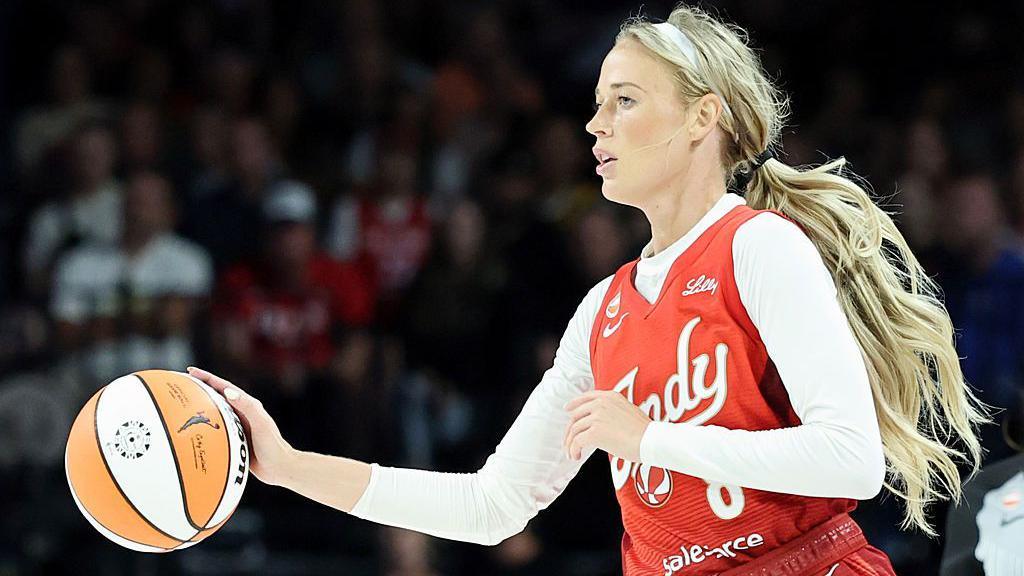 Sophie Cunningham dribbles the ball while playing for the Indiana Fever