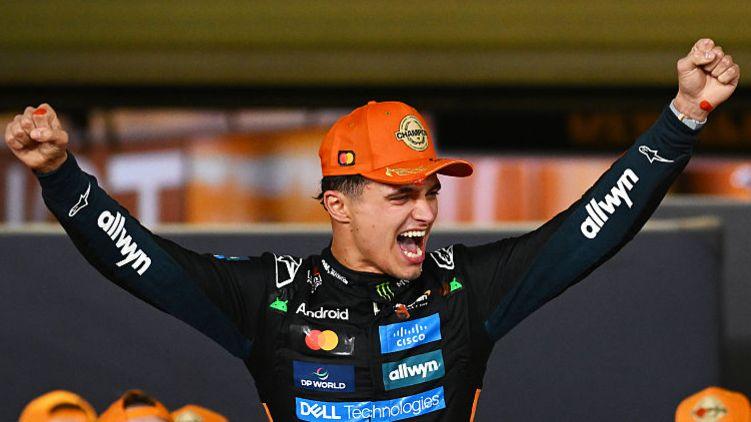 Lando Norris smiling after winning a race