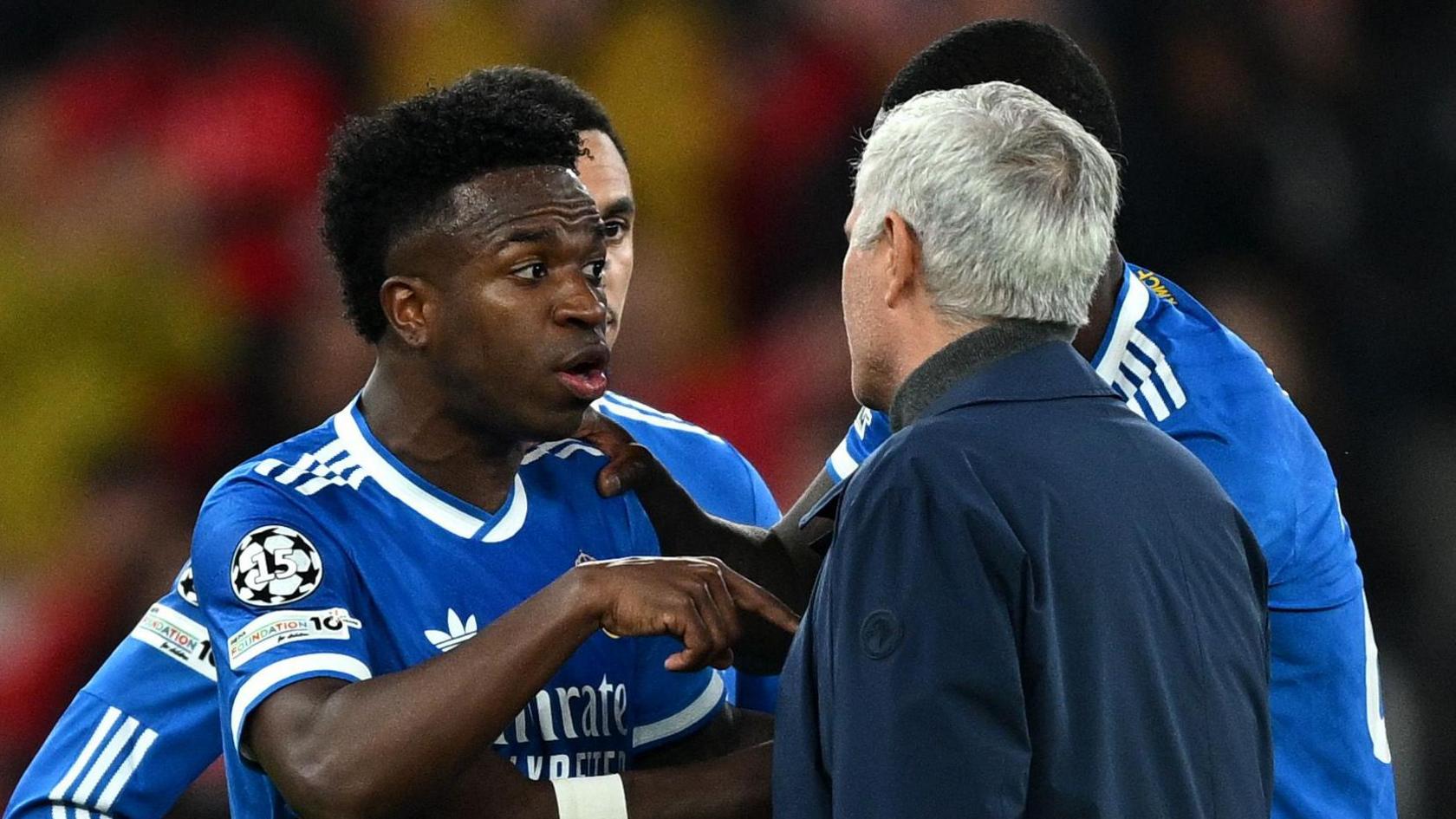 Vinicius Junior in conversation with Jose Mourinho
