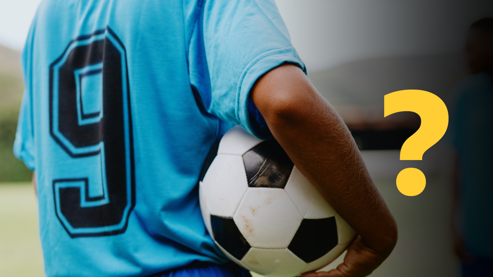 A generic picture of an unknown footballer holding a ball