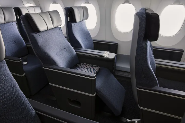 Image may contain Cushion Home Decor Chair Furniture Couch Aircraft Transportation and Vehicle