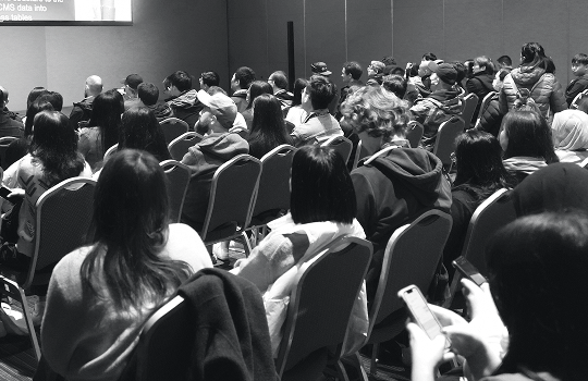 Students in an auditorium.
