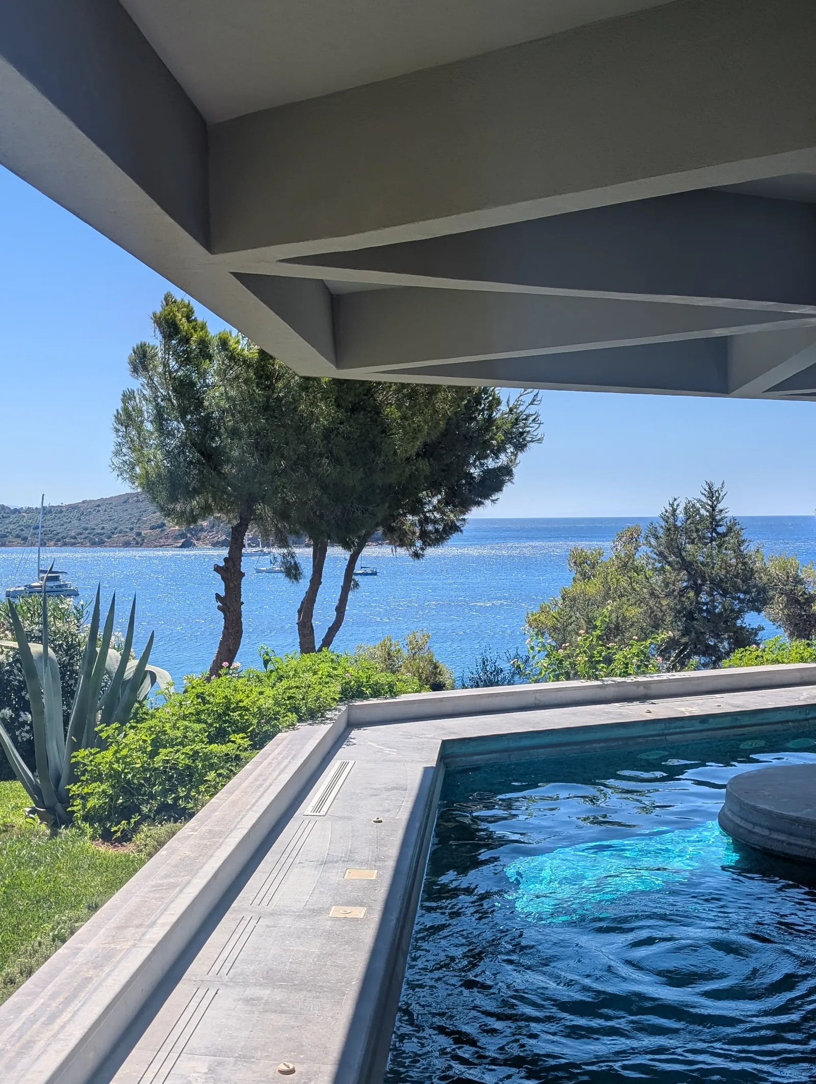 Image may contain Pool Water Swimming Pool Nature Outdoors Scenery Architecture Building House Housing and Villa