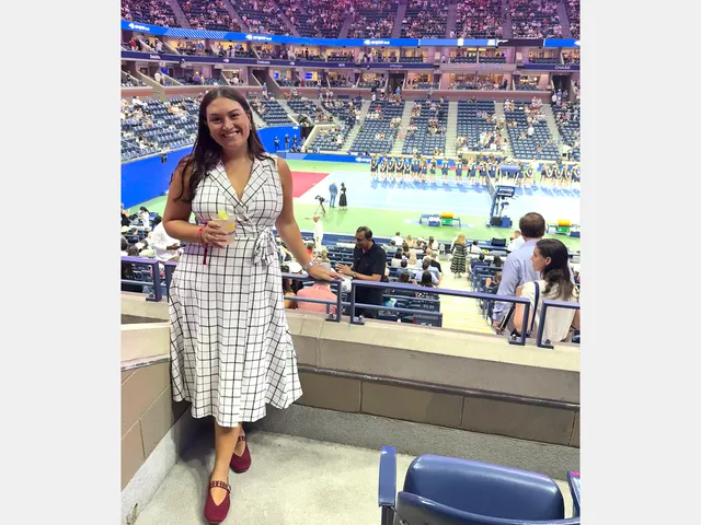 Image may contain: Face, Head, Person, Photography, Portrait, Adult, Architecture, Arena, Building, Stadium, and Racket