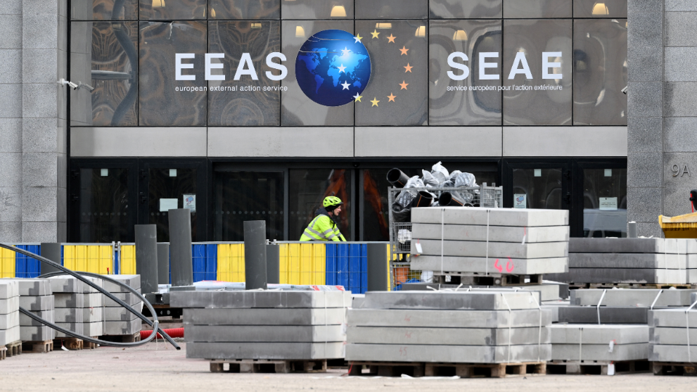 A cyclist rides past the European External Action Service (EEAS) building in Brussels