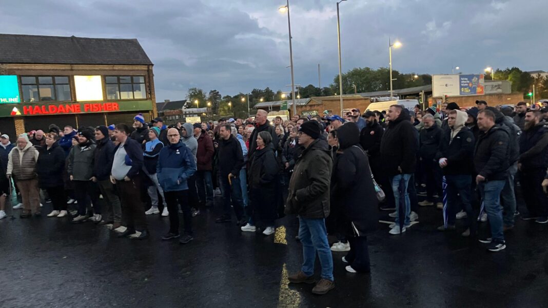 More talks over Drumcree dispute as stalemate continues A crowd of people gather together on a road.