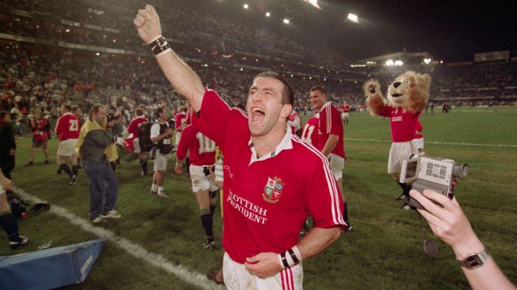 John Bentley celebrates with fans