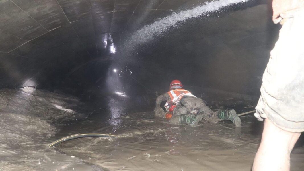 ‘Layer upon layer of miracles’: How Nepal flood survivors were rescued from tunnel Nepalese rescuers wading through puddles of water in the Trishuli 3A tunnel