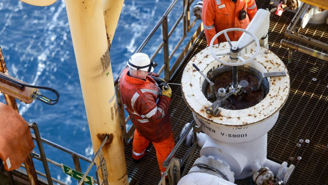 Hundreds of North Sea workers too heavy for new helicopter rules Two workers wearing orange overalls and a hard hats fix a pig launcher on the Armada gas condensate platform, operated by BG Group Plc, in the North Sea, off the coast of Aberdeen.