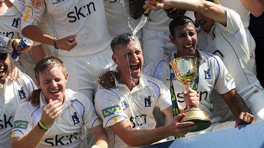 From left: Ian Westwood, Jim Troughton and Varun Chopra help celebrate the 2012 title win at Worcester (6 September 2012)
