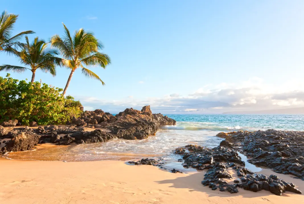 Labor Day Weekend Is a Gold Mine for Travel Deals—Here Are the Best Ones We’ve Found 072325 secret cove maui gettyimages