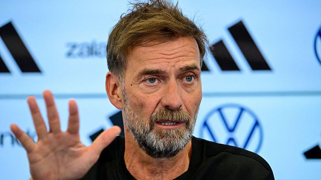 Jurgen Klopp talks in a press conference