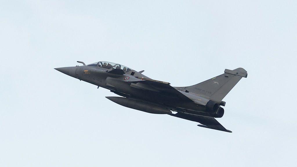 A Rafale B standard F4 fighter jet of France's air force flies as part of Nato's Enhanced Air Policing (eAP) mission in the Baltic States, on December 17, 2024 at Siauliai airbase in Lithuania.