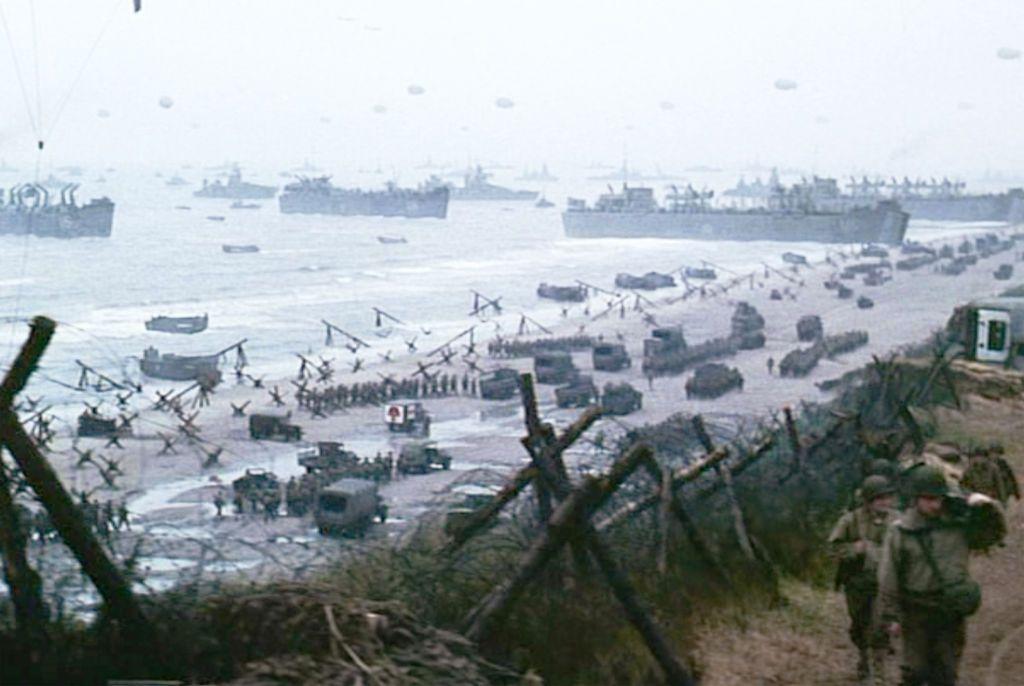 The Normandy landings in Saving Private Ryan, with boats and soldiers on the beaches