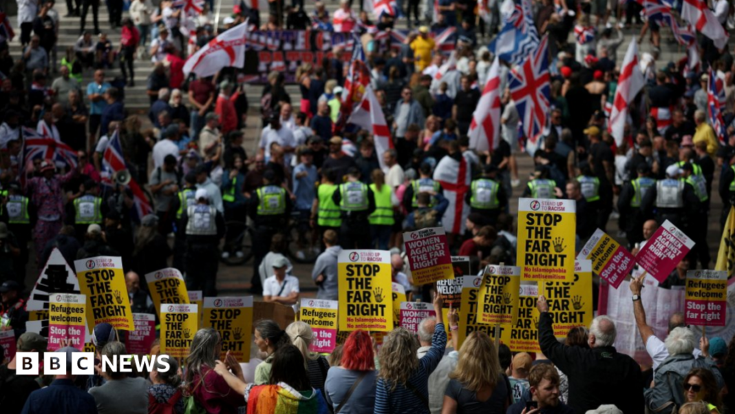 Man charged with concealing identity at protest Man charged with concealing identity at protest