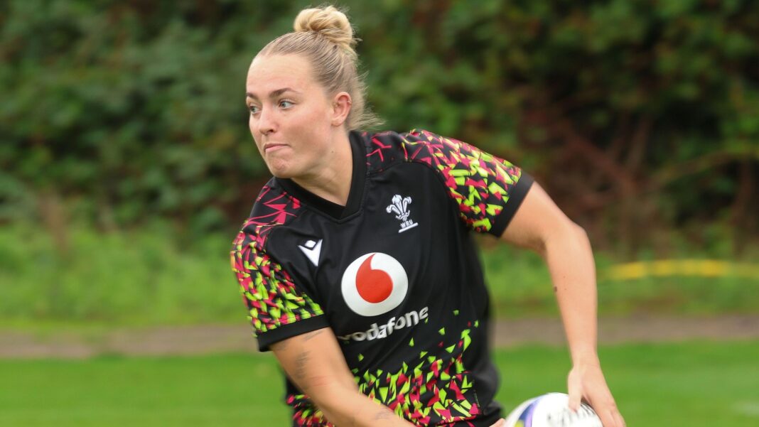 Megan Davey passes the ball in Wales training