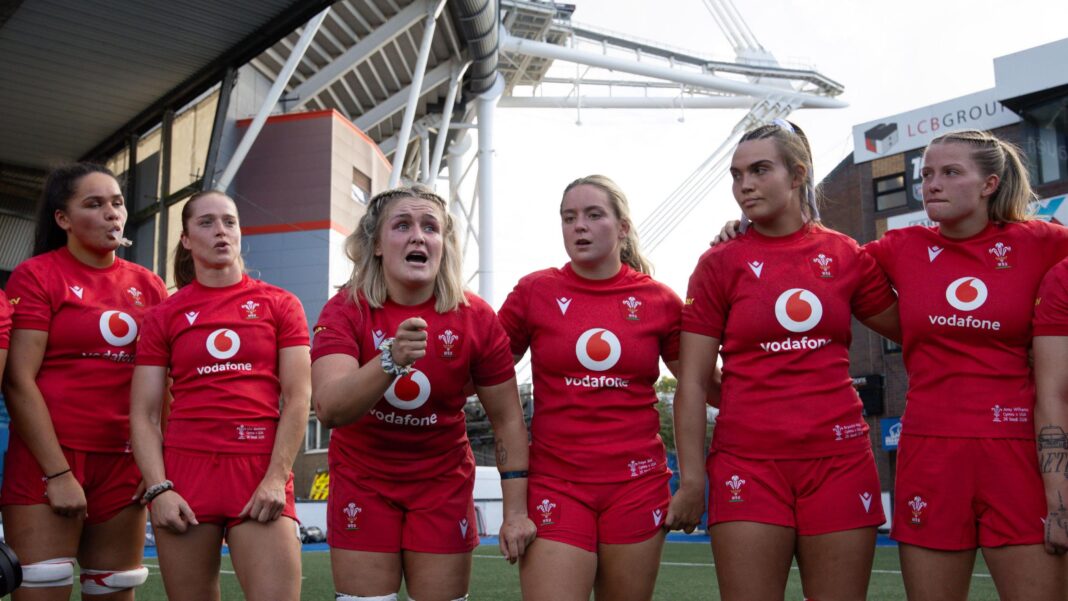 Alex Callender leads a team talk in Wales' huddle