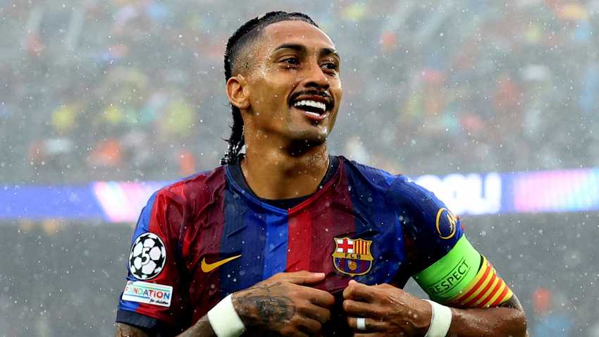 Raphinha celebrates scoring for Barcelona against Feyenoord in the Champions League