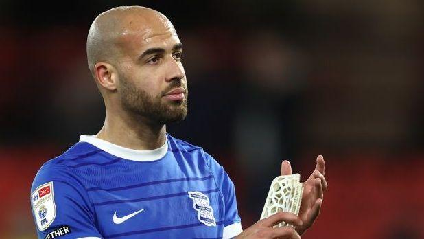 Jordan Graham in blue Birmingham shirt