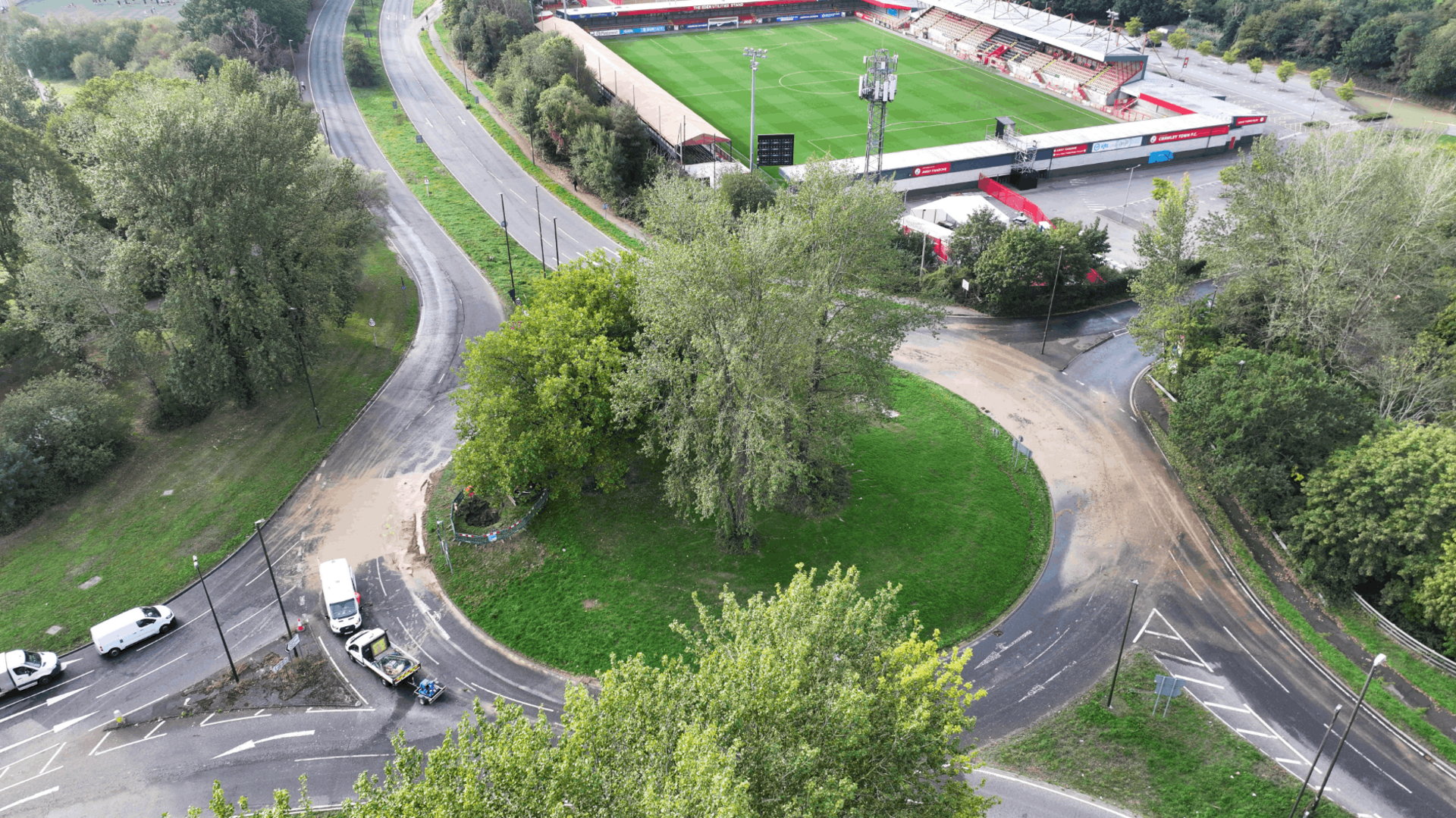 Aerial image of flooding on road next to football pitch