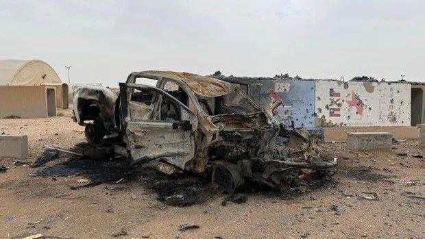 An undated photo, obtained by CBS News from active duty service members, shows car reportedly destroyed in an Iranian strike at Camp Buehring, Kuwait.