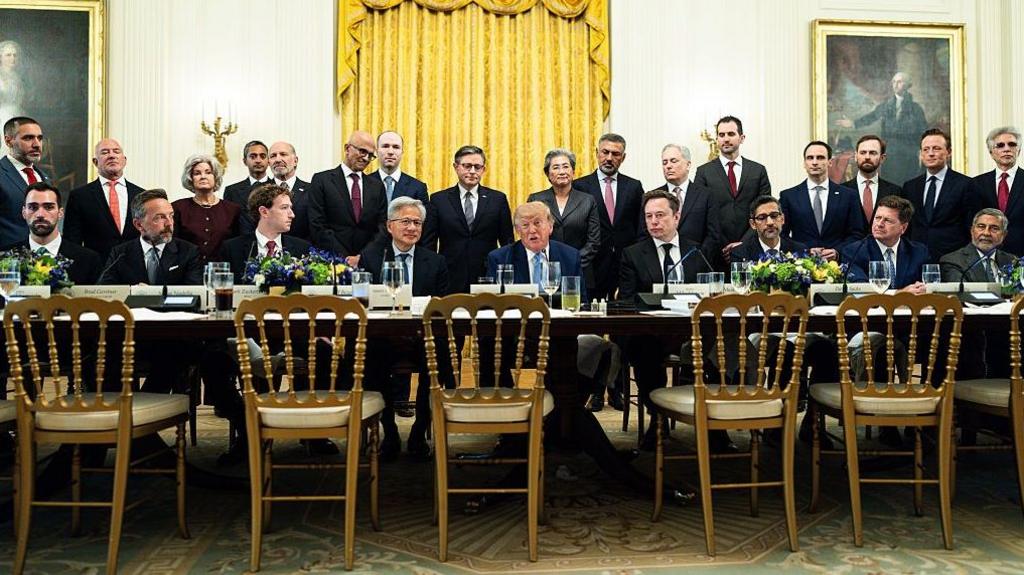 US President Donald Trump, center, speaks during a meeting with tech executives on artificial intelligence in the East Room of the White House in Washington, DC, US, on Tuesday, Sept. 29, 2026.
