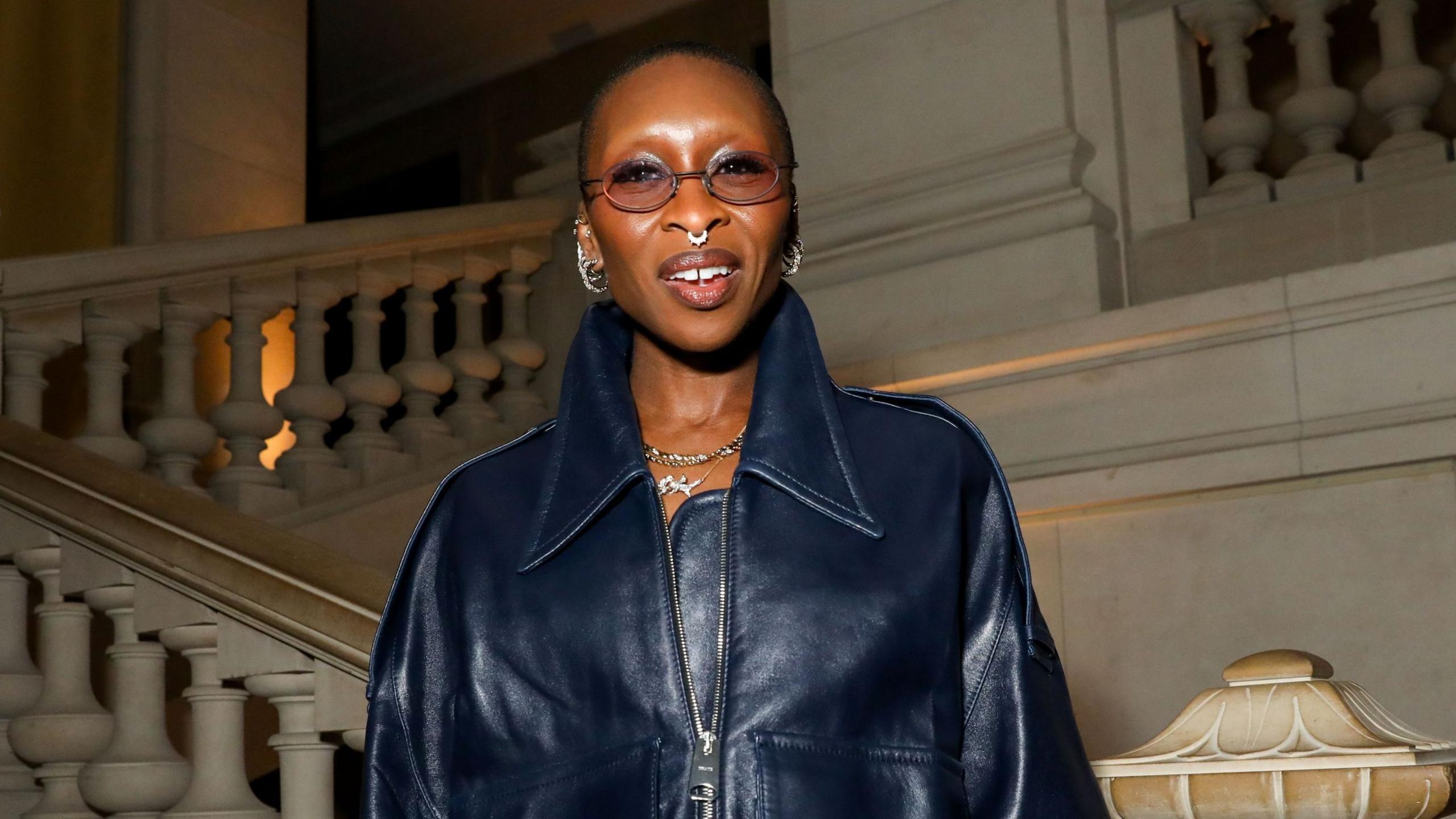 Cynthia Eriva in a black leather-look jacket at the Tiffany & M.A.D. dinner in Paris