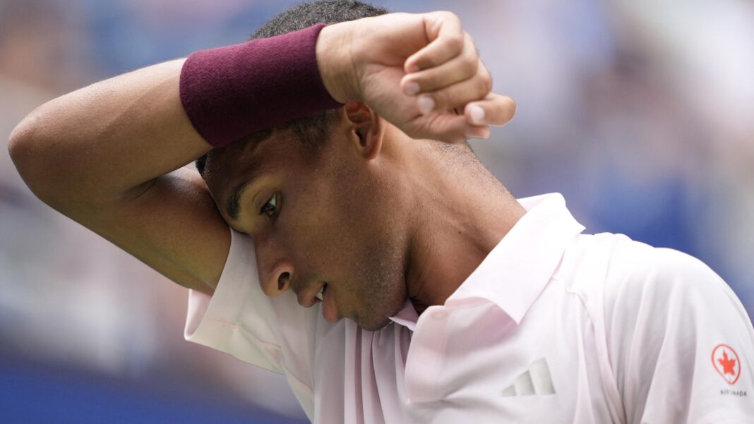 ‘I was seeing spots’ – third seed Auger-Aliassime stunned in New York Felix Auger-Aliassime wipes his brow during his US Open defeat by Karen Khachanov