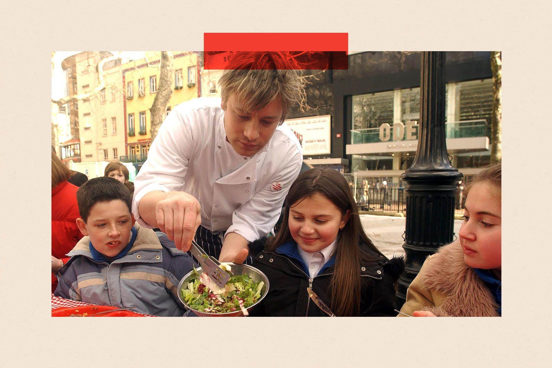 Jamie Oliver serves salad to schoolchildren