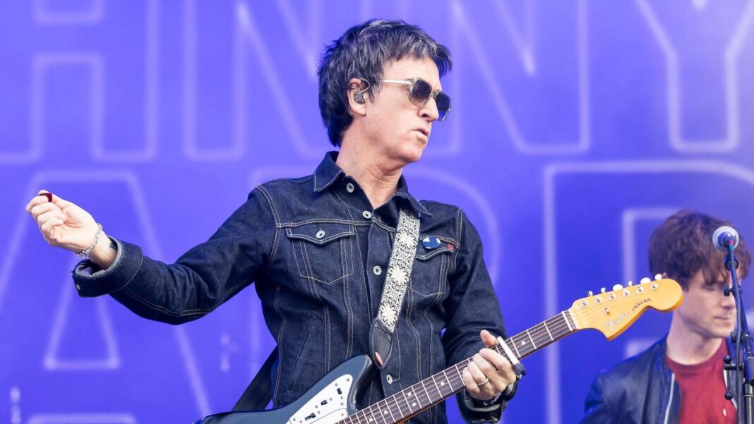 Noel Gallagher says Johnny Marr has ‘always been gung-ho’ with his guitars Johnny Marr plays guitar on stage